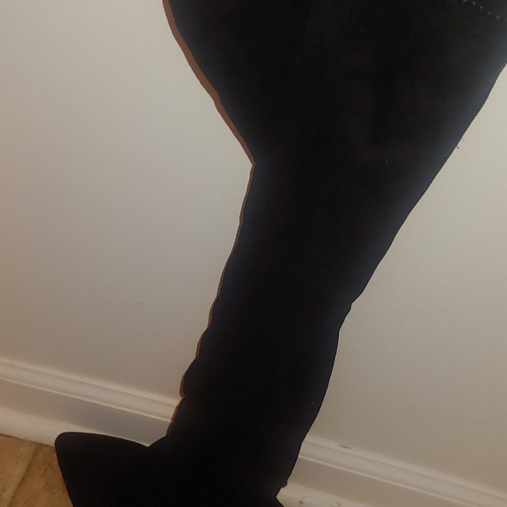 A size 10 thigh high wide boots heals.,  their suede boots